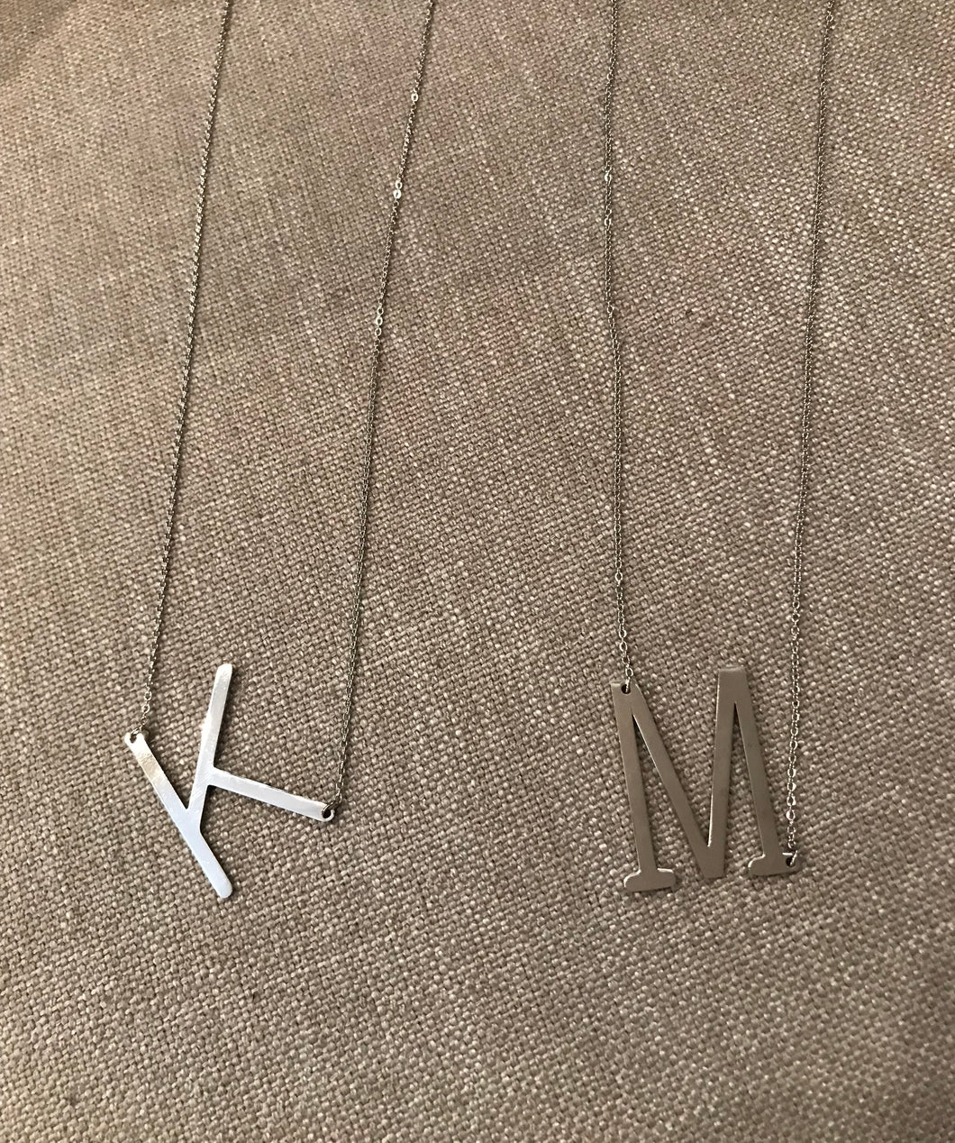 Silver initial necklaces